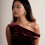 Fringe chandelier diamond earring worn on model