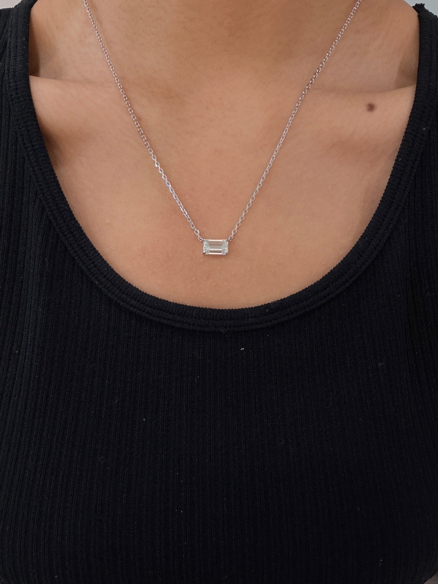 Emerald Solitaire Pendant 2CT worn on model