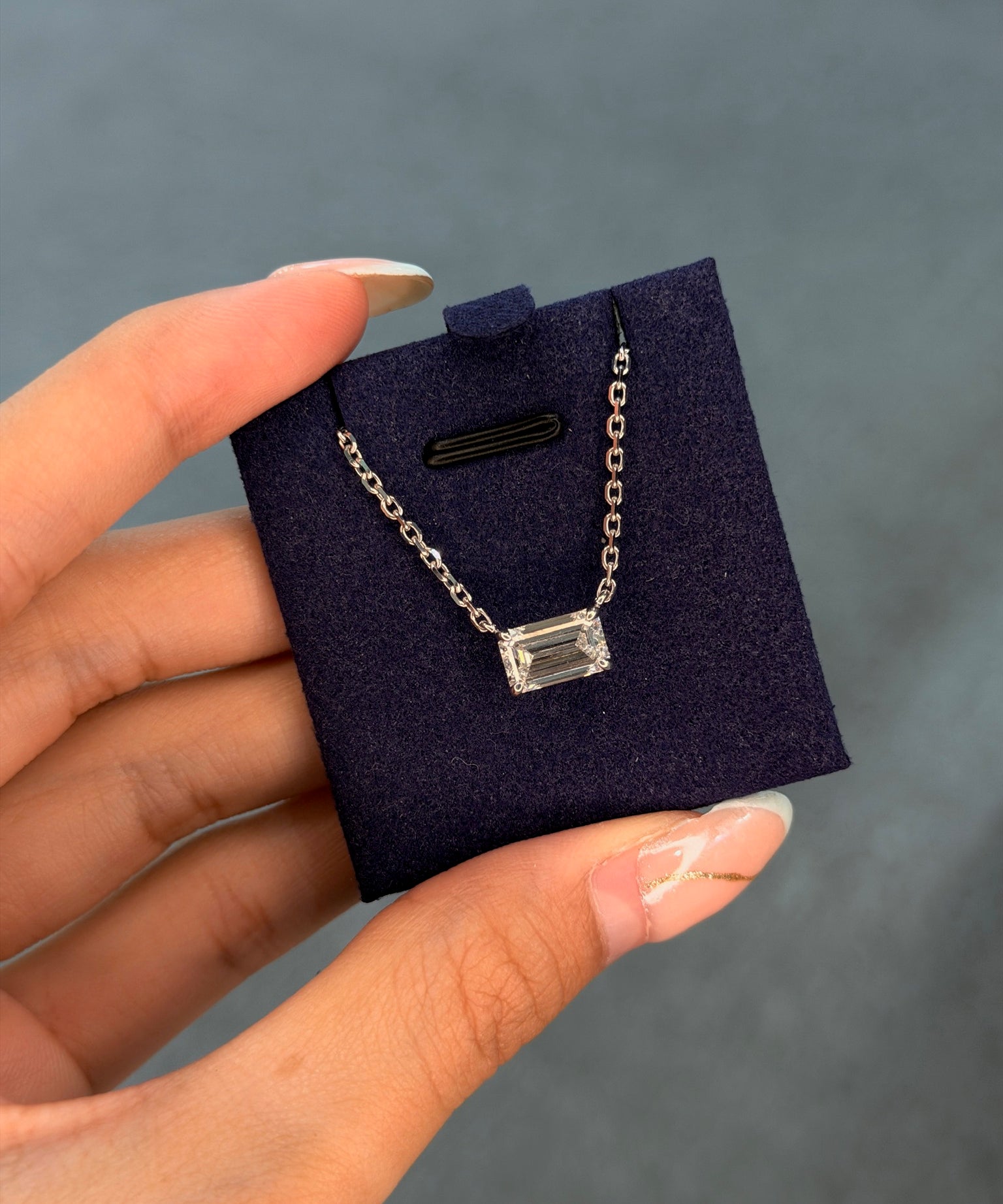 Emerald Solitaire Pendant 2CT in hand